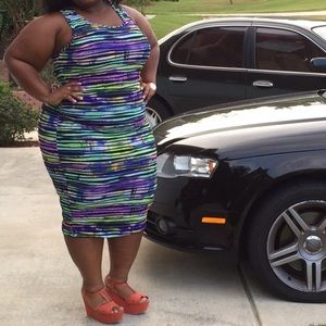 A slimming body con dress.